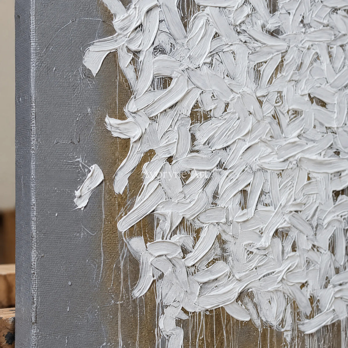 Close-up of the hand-painted texture of Lucent Field ivory curl relief wall art on an easel