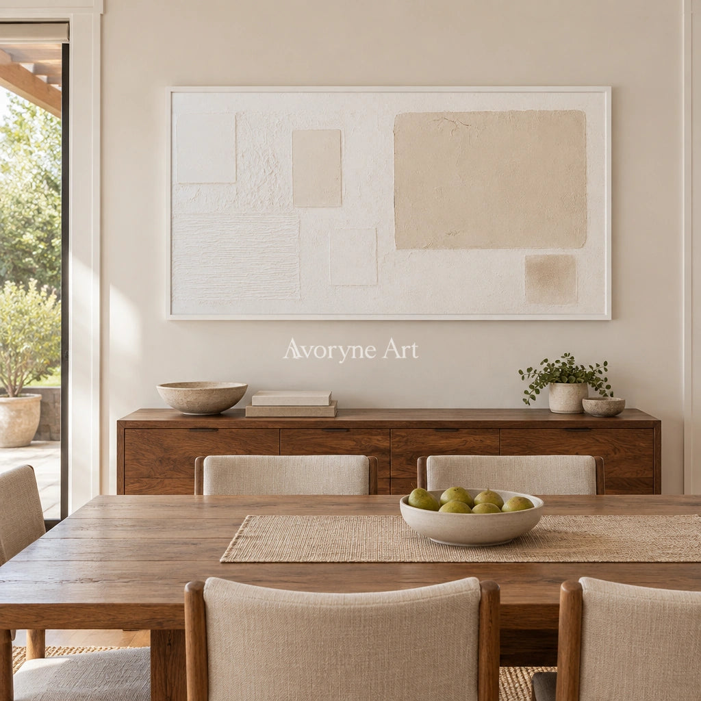 Woven Current ivory geometric art with a white frame in a dining room
