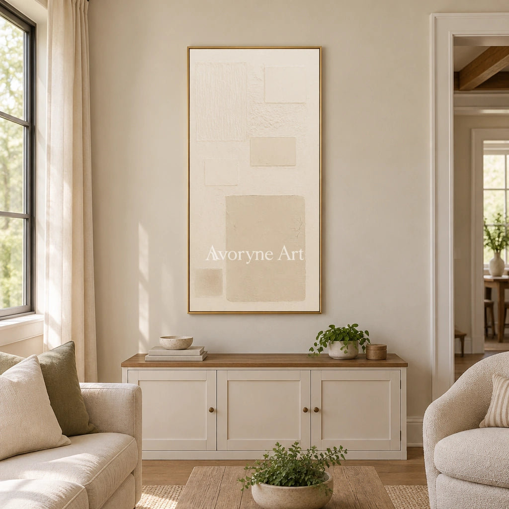 Woven Gesture ivory geometric art with a gold frame hanging in a living room