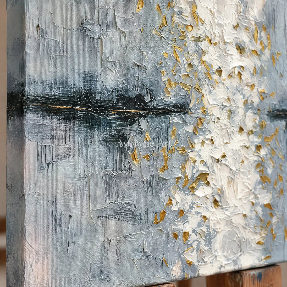 Close-up of the hand-painted texture of Lucent Haven ivory gold relief wall art on an easel