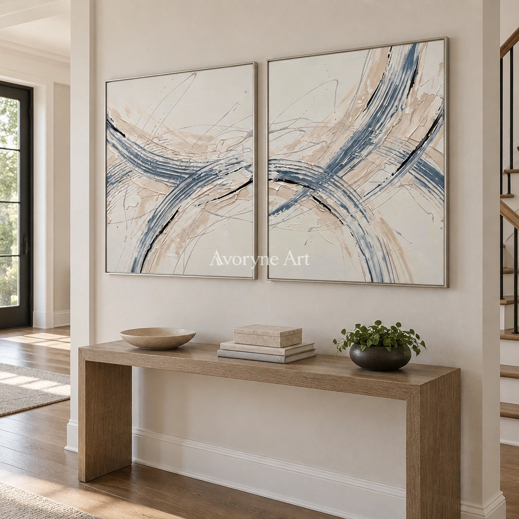 Golden Drift linear abstract diptych with a silver frame in an entryway