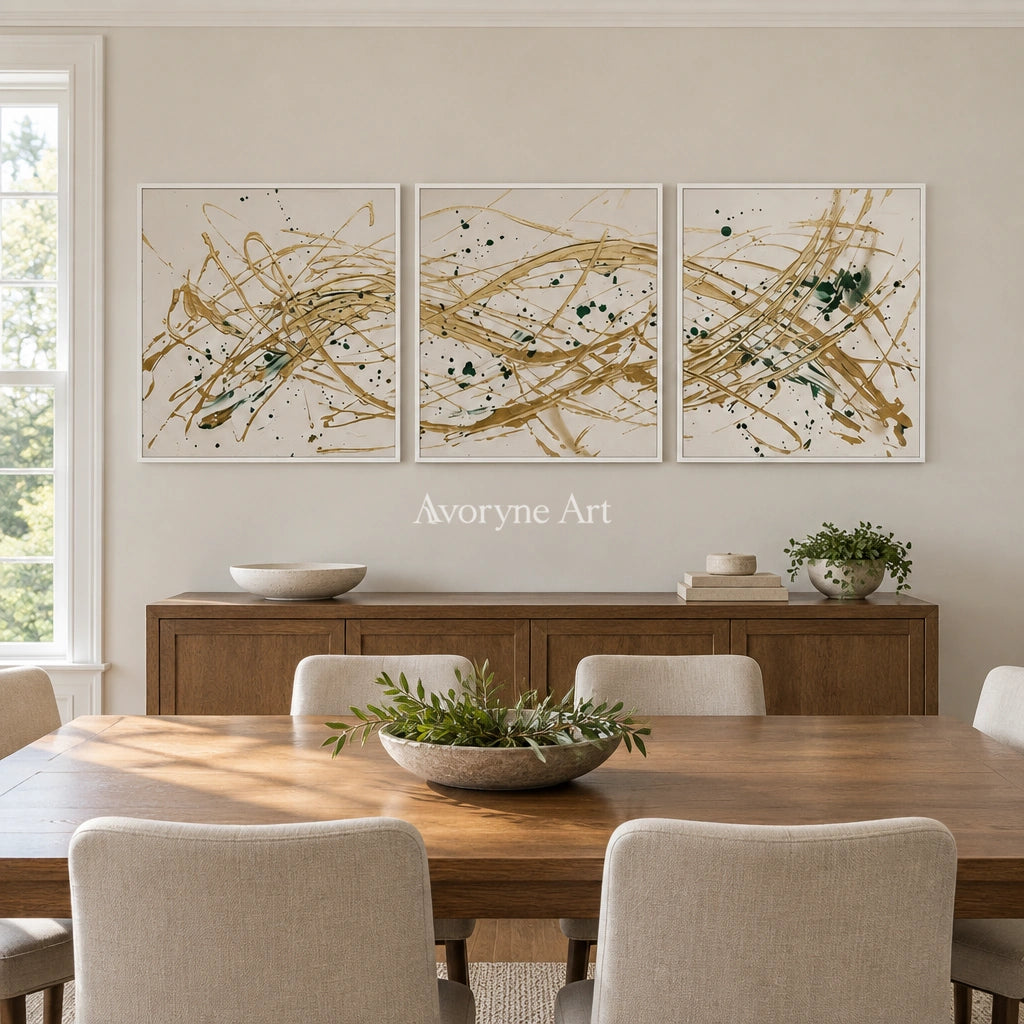 Golden Reverie linear abstract triptych with a white frame in a dining room