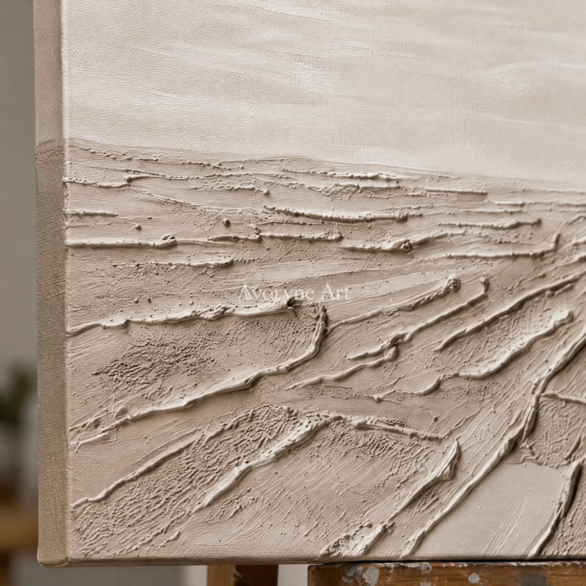 Close-up of the hand-painted texture of Soft Verse mineral texture wall art on an easel