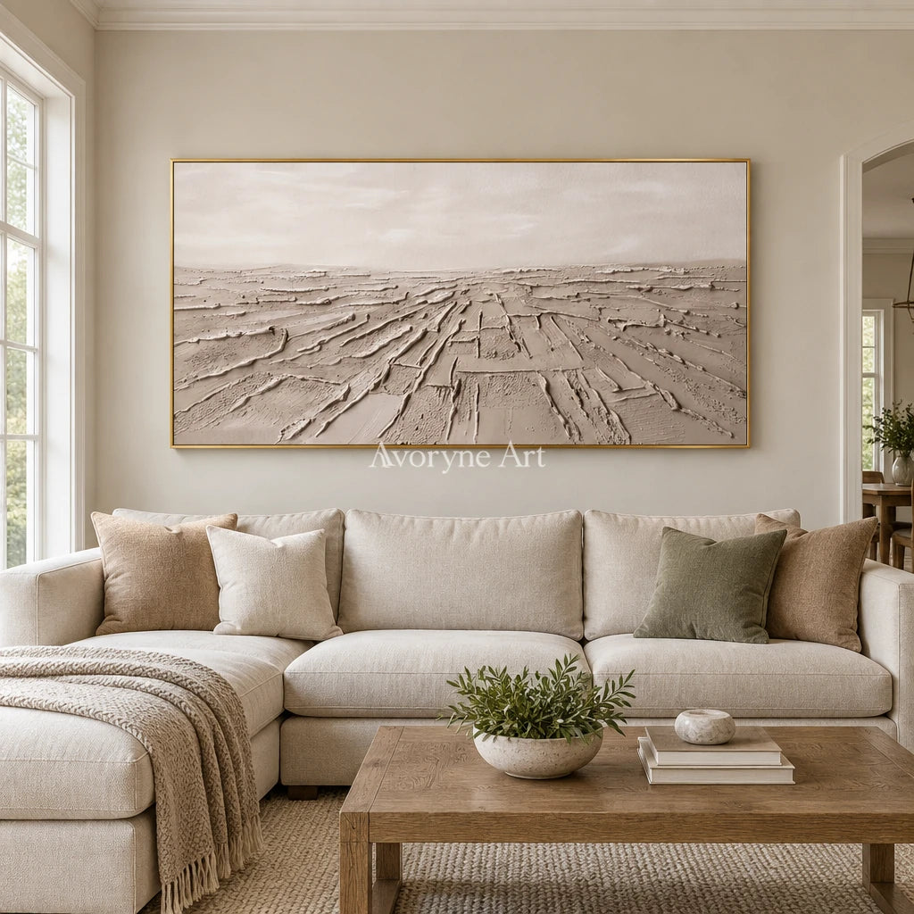 Soft Verse mineral texture wall art with a gold frame hanging in a living room