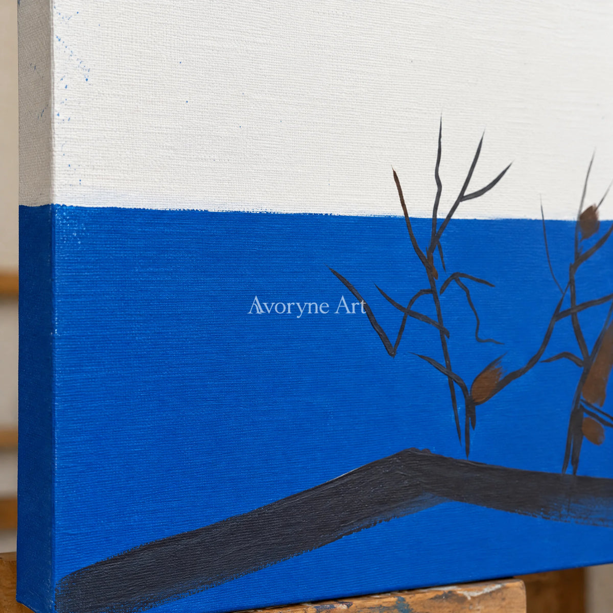 Close-up of the hand-painted texture of Deep Reverie minimal branch wall art on an easel