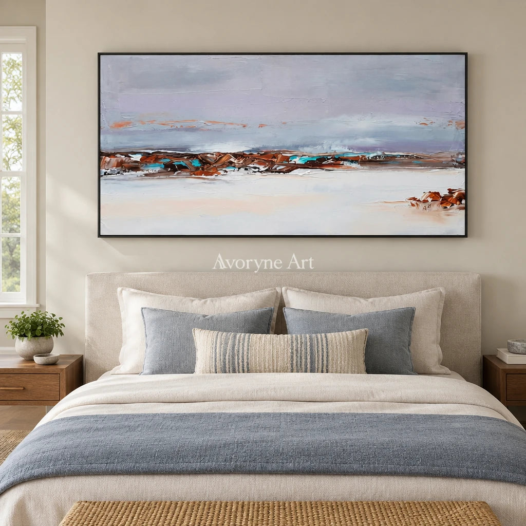Blue Reverberation minimal landscape wall art with a black frame above a bed in a bedroom