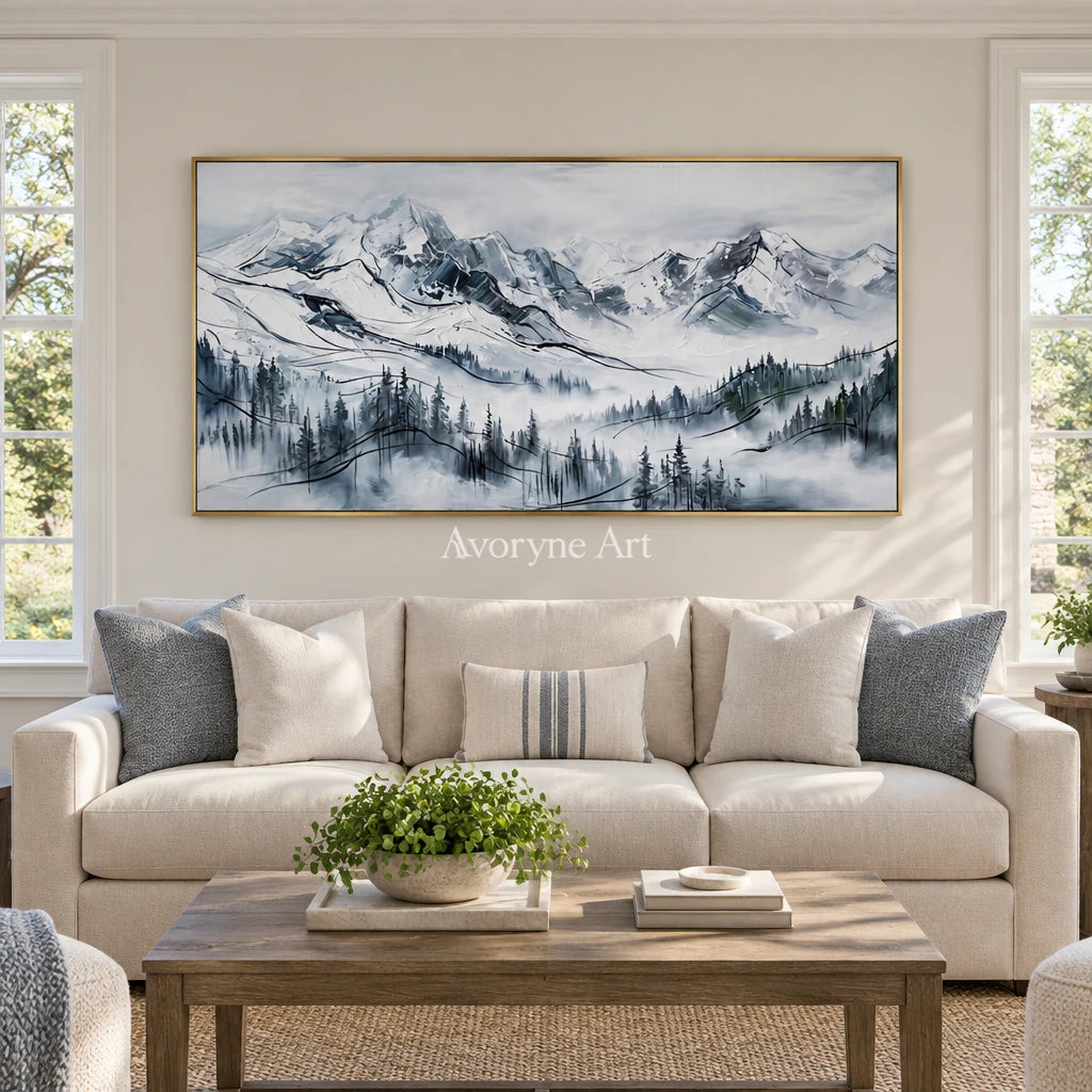 Silver Prelude mountain landscape wall art with a gold frame hanging in a living room