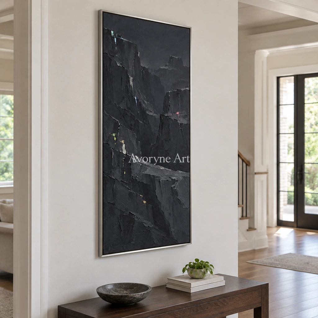 Still Dialogue mountain relief wall art with a silver frame in an entryway