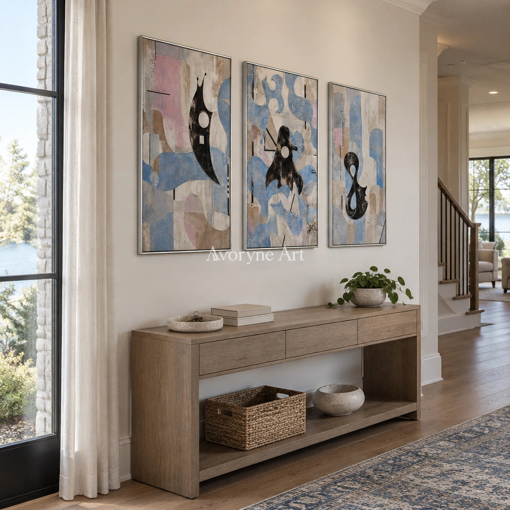 Woven Horizon muted organic abstract triptych with a silver frame in an entryway
