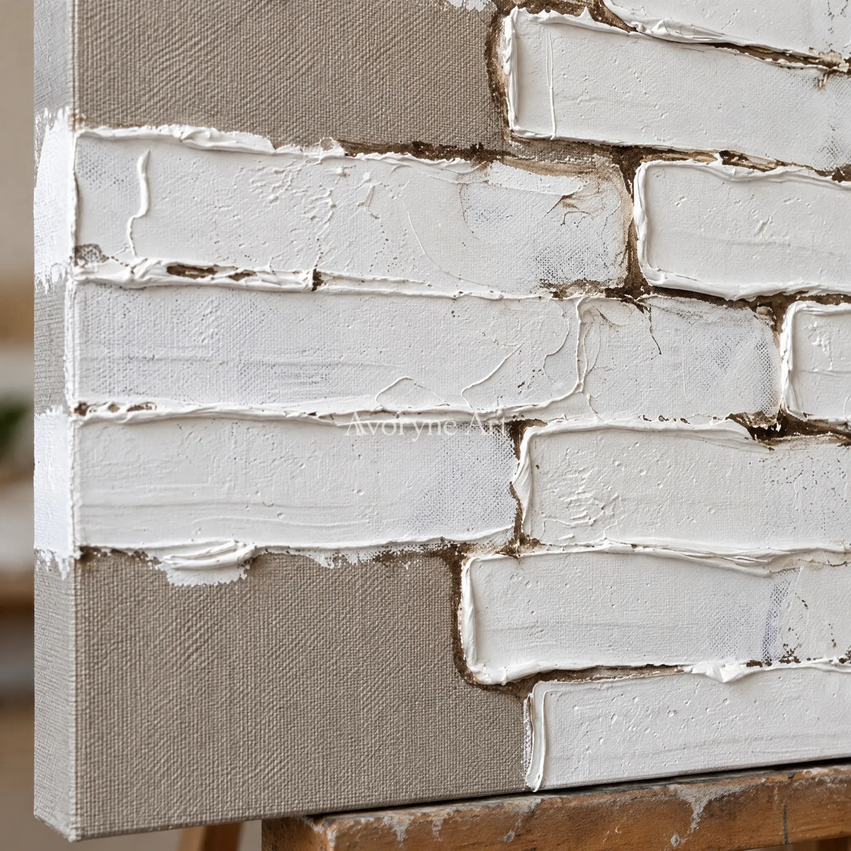 Close-up of the hand-painted texture of Misted Gesture neutral block relief wall art on an easel