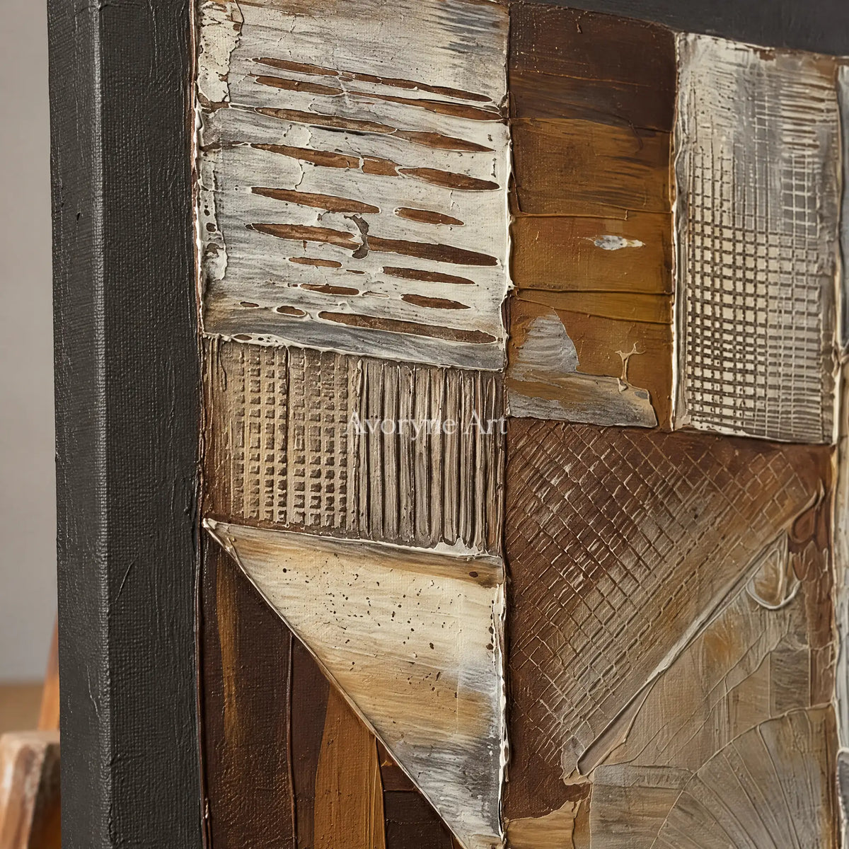 Close-up of the hand-painted texture of Hushed Verse neutral geometric relief wall art on an easel