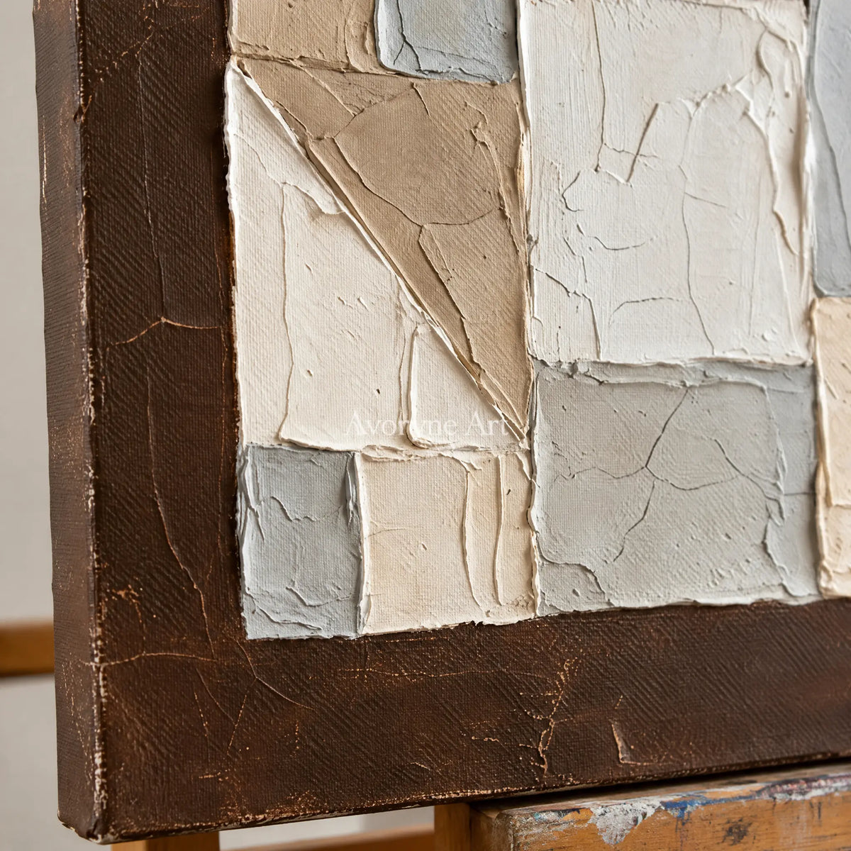 Close-up of the hand-painted texture of Mineral Rhythm neutral geometric relief diptych on an easel