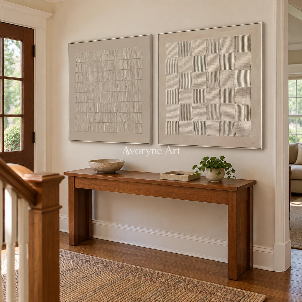 Muted Reverie neutral grid art diptych with a silver frame in an entryway