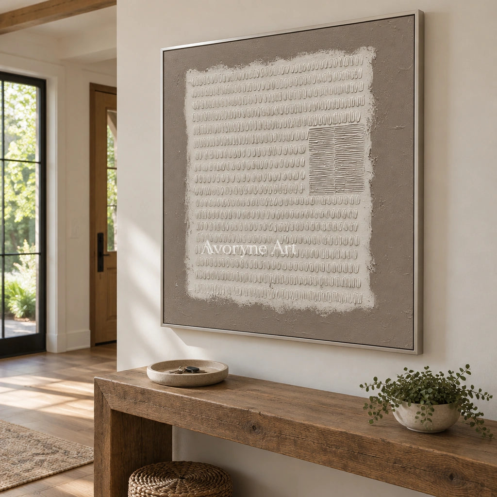 Woven Mosaic neutral grid texture wall art with a silver frame in an entryway