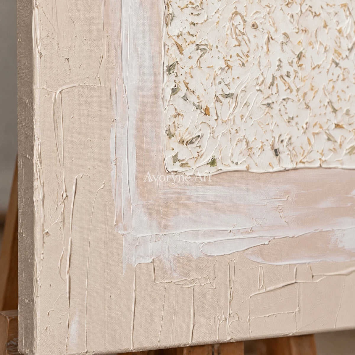 Close-up of the hand-painted texture of Weathered Refrain neutral layered relief wall art on an easel