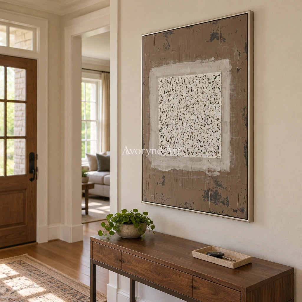 Weathered Measure neutral layered relief wall art with a silver frame in an entryway