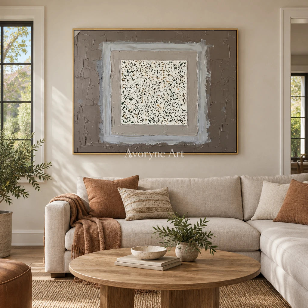 Weathered Drift neutral layered relief wall art with a gold frame hanging in a living room