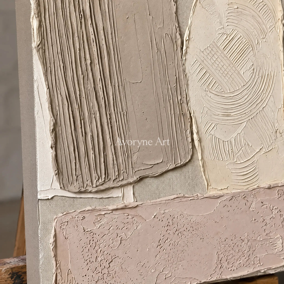 Close-up of the hand-painted texture of Weathered Haven neutral patch relief wall art on an easel