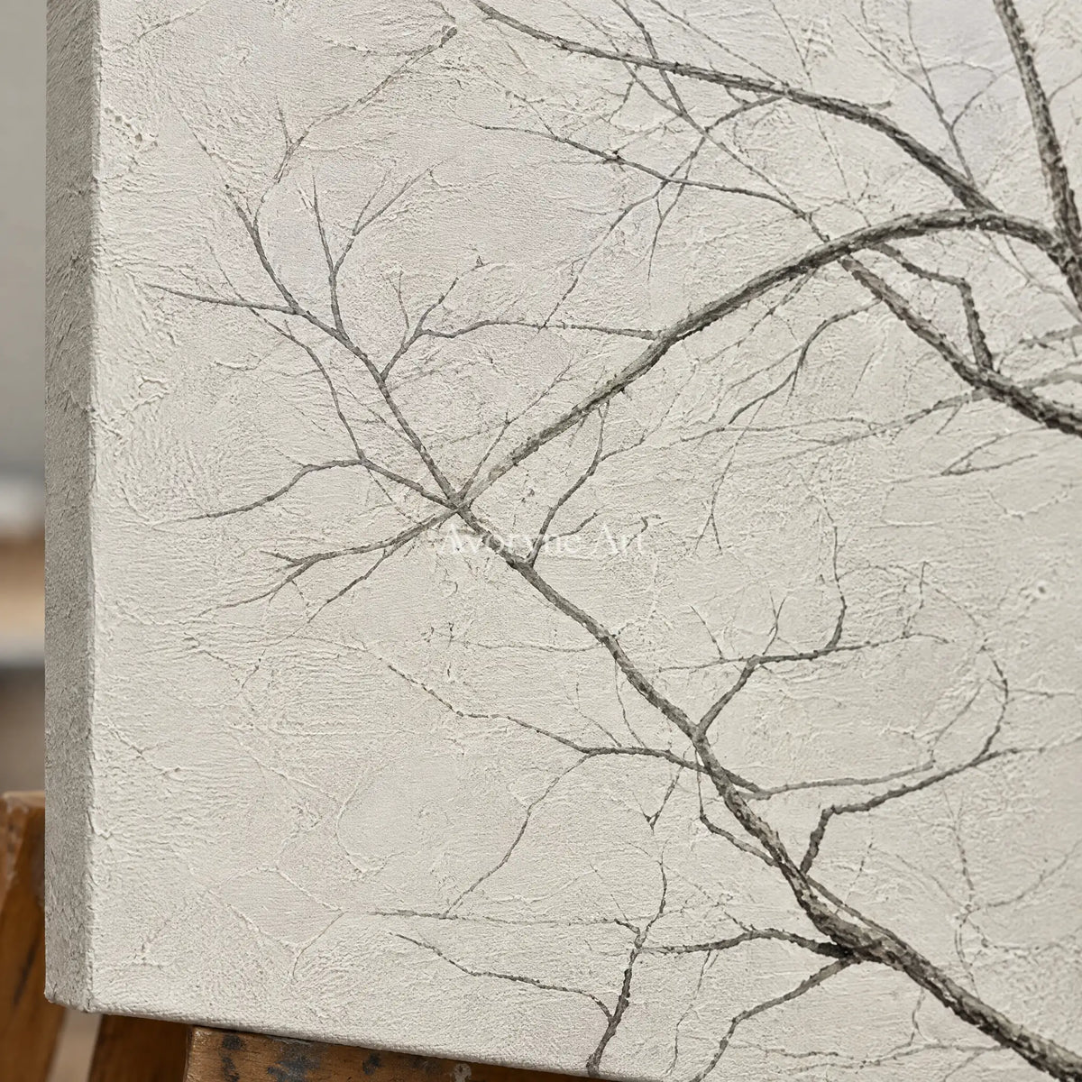 Close-up of the hand-painted texture of Muted Drift neutral tree texture diptych on an easel