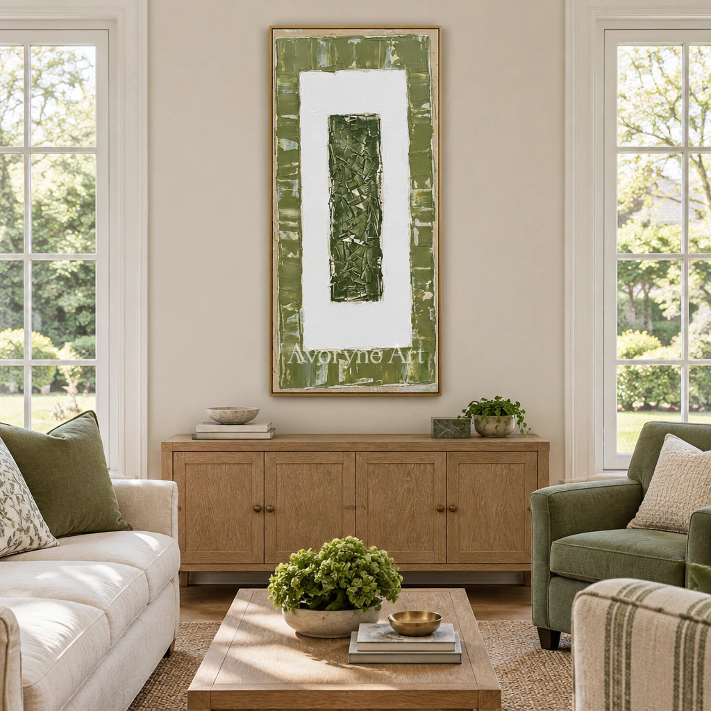 Mineral Haven olive ivory grid wall art with a gold frame hanging in a living room