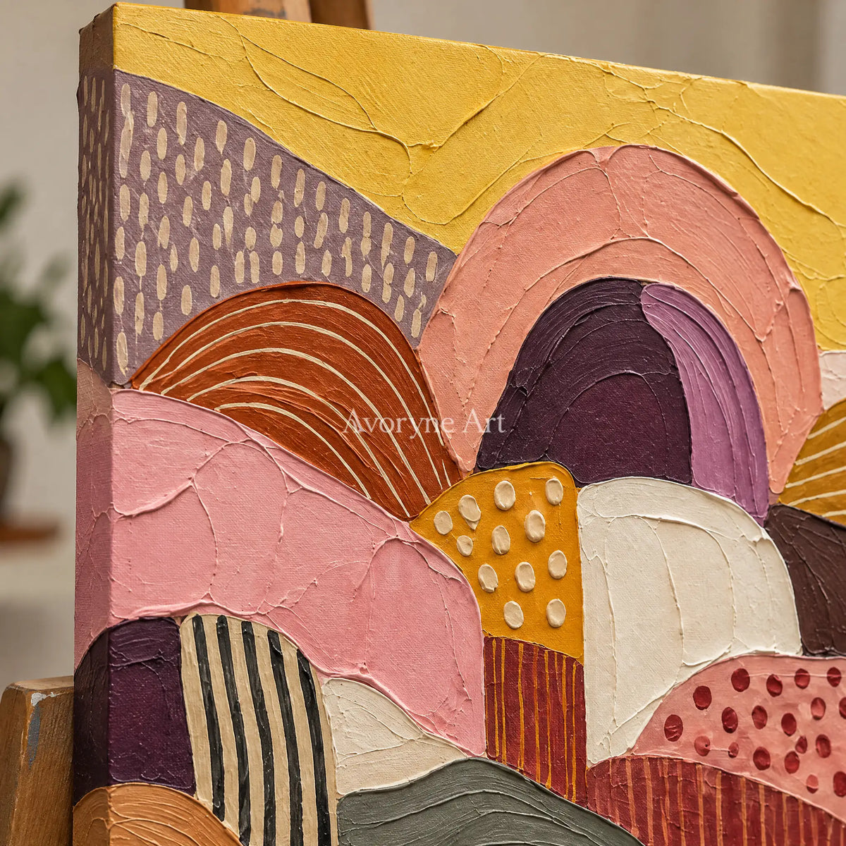 Close-up of the hand-painted texture of Amber Solace patterned field wall art on an easel
