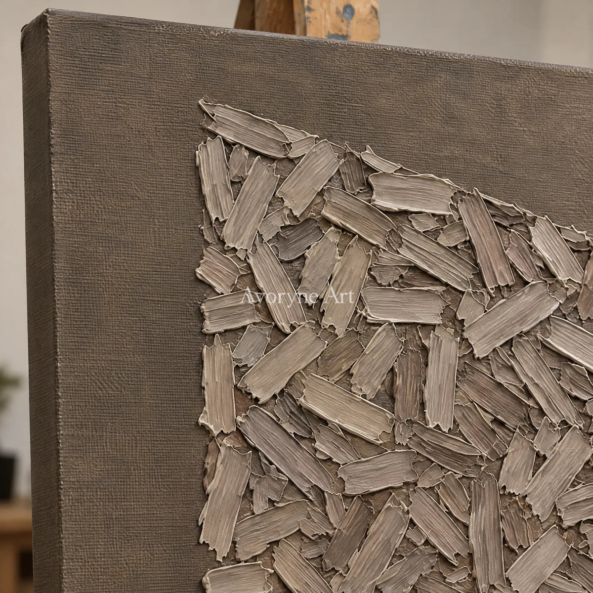 Close-up of the hand-painted texture of Quiet Cadence relief mosaic wall art on an easel