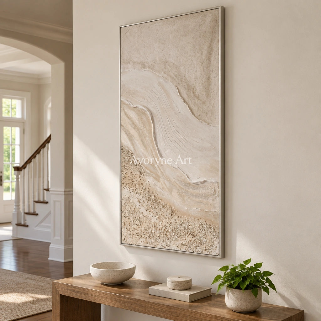 Quiet Story ripple relief wall art with a silver frame in an entryway