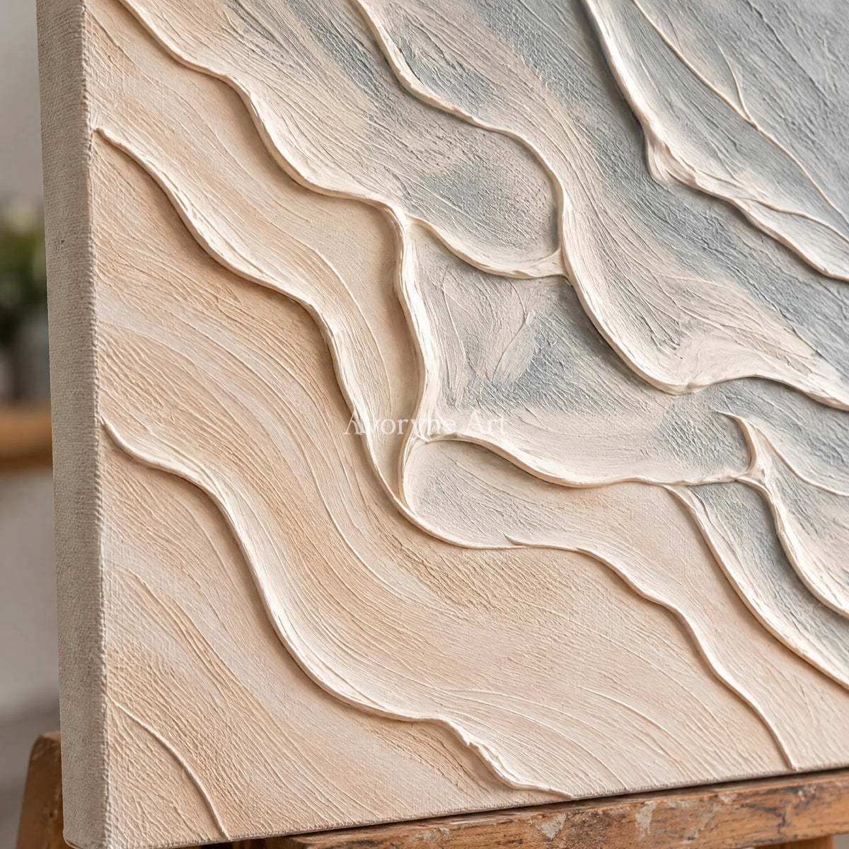 Close-up of the hand-painted texture of Quiet Solace ripple relief diptych on an easel