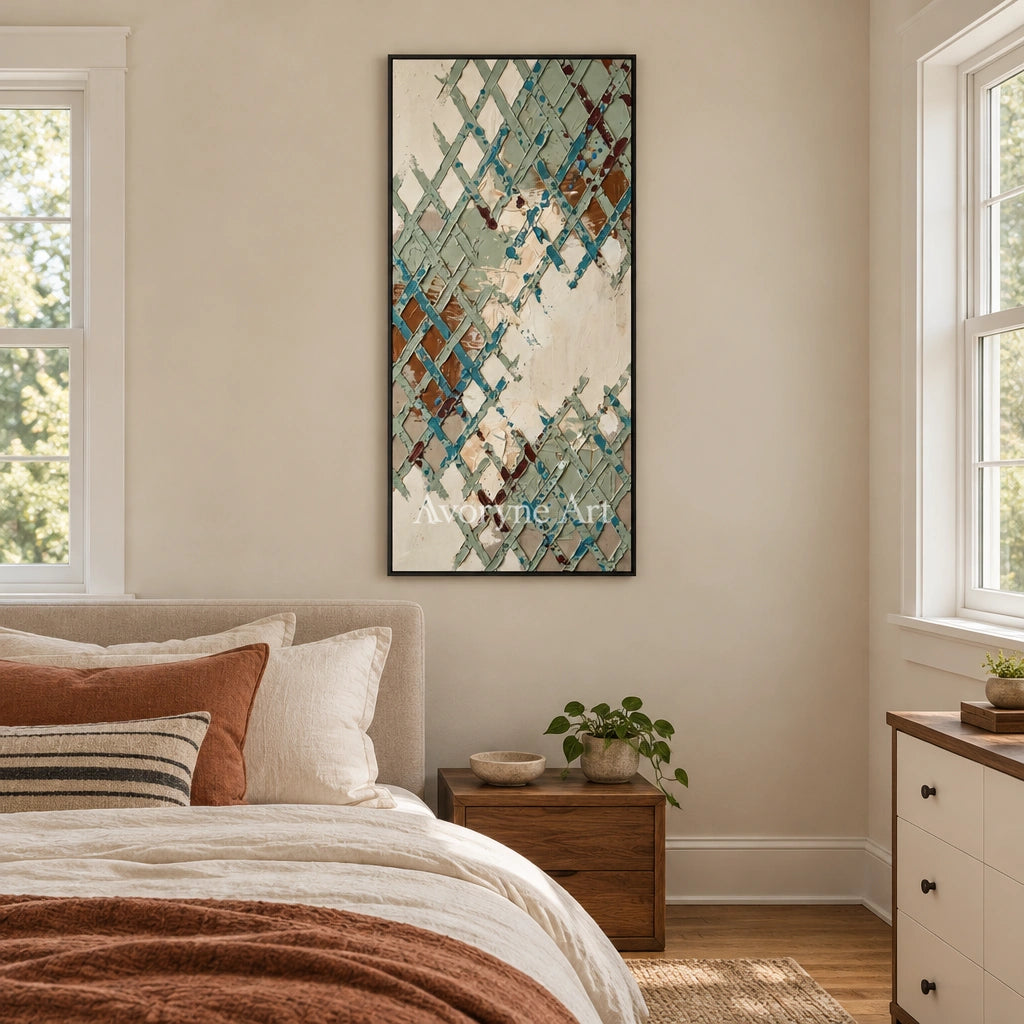 Weathered Sonata sage earth grid wall art with a black frame above a bed in a bedroom