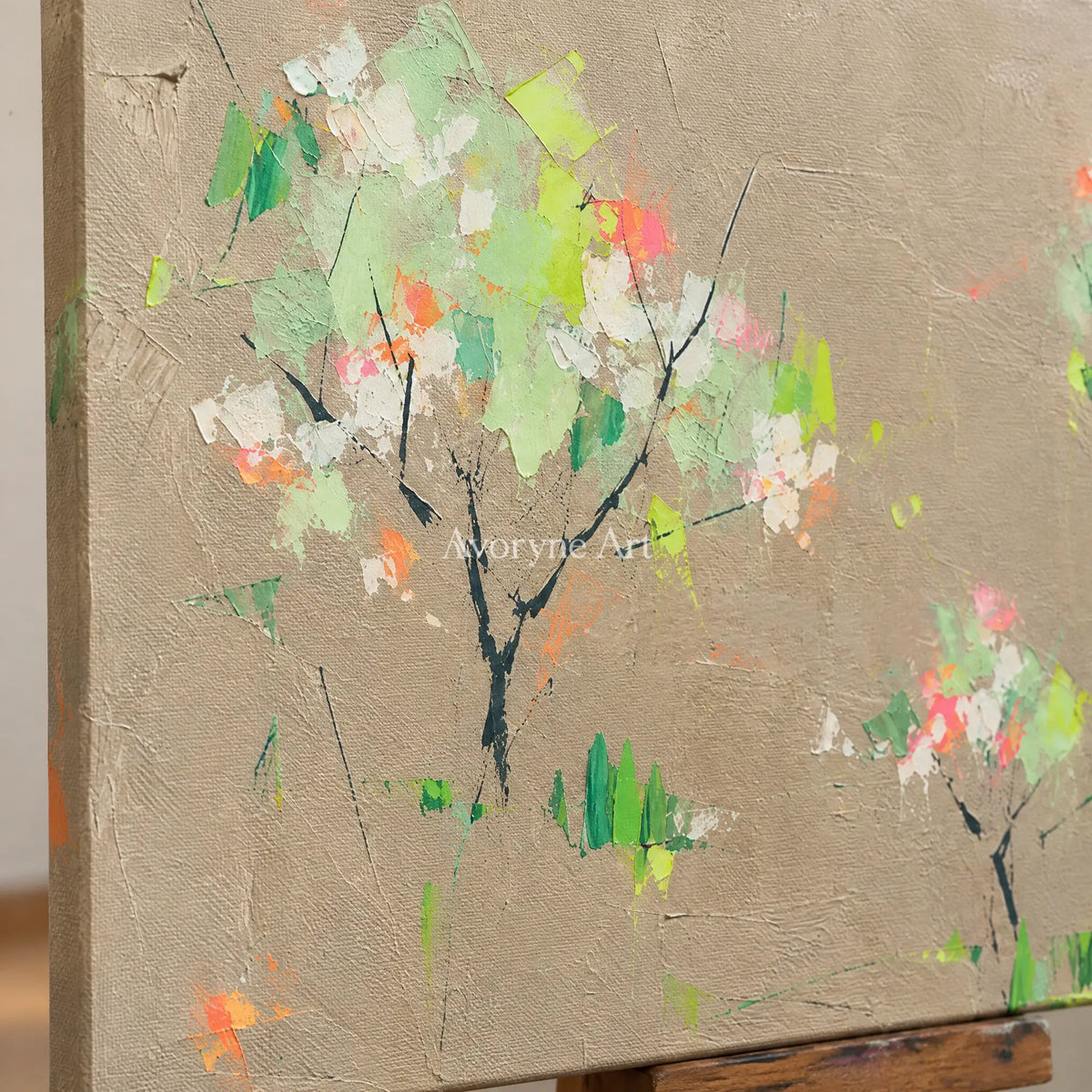 Close-up of the hand-painted texture of Still Rhythm small figure landscape wall art on an easel