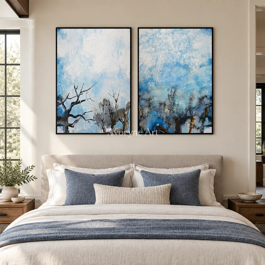 Pale Mosaic snow branch diptych with a black frame above a bed in a bedroom