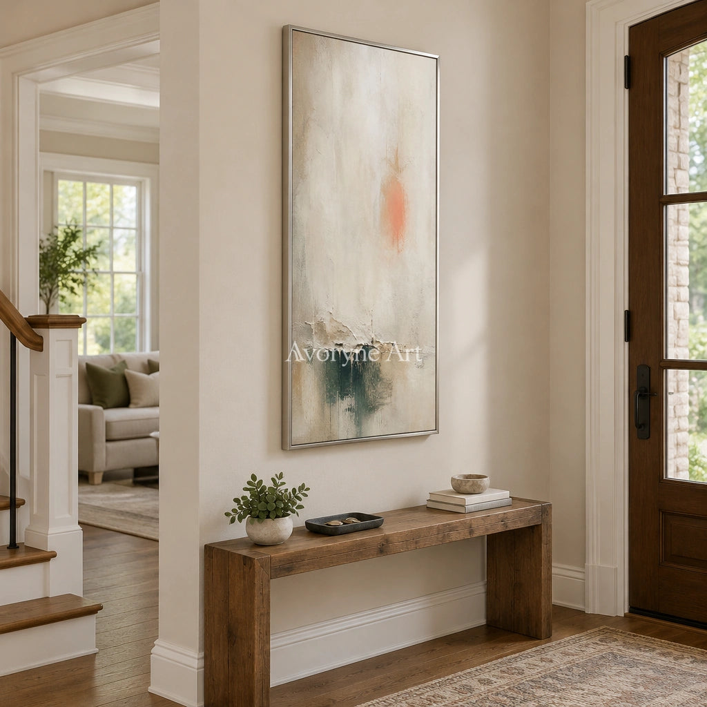Woven Refrain soft neutral abstract wall art with a silver frame in an entryway