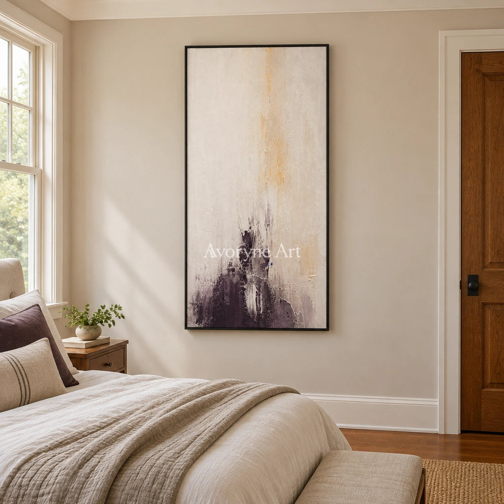 Woven Haven soft neutral abstract wall art with a black frame above a bed in a bedroom