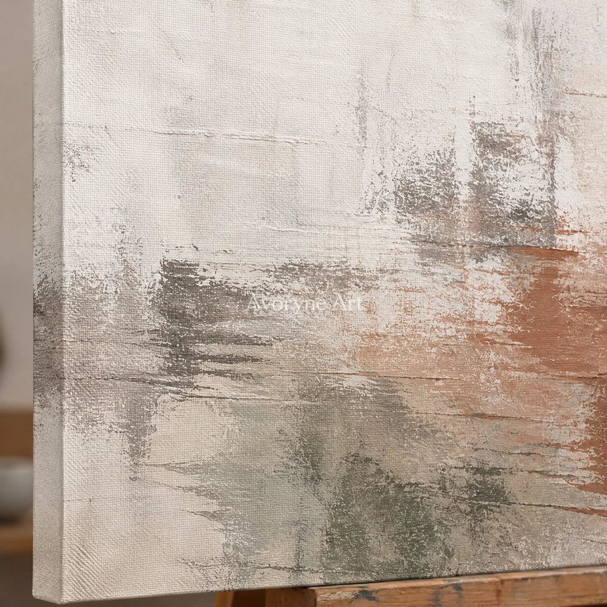 Close-up of the hand-painted texture of Woven Echo soft neutral abstract wall art on an easel