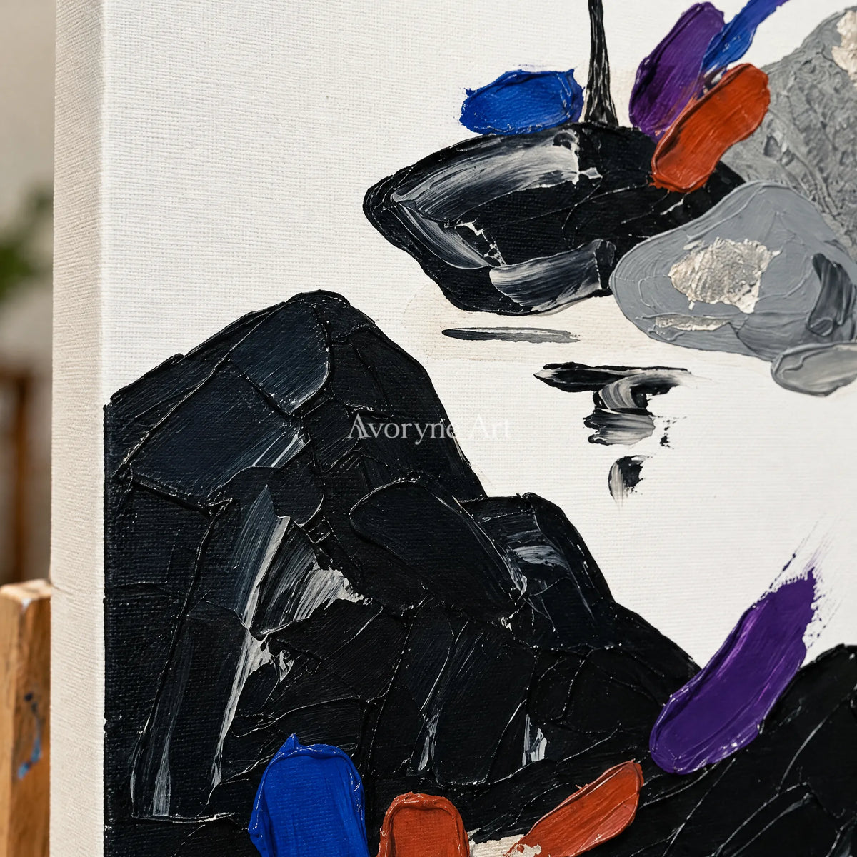 Close-up of the hand-painted texture of Misted Refrain surreal stone landscape wall art on an easel