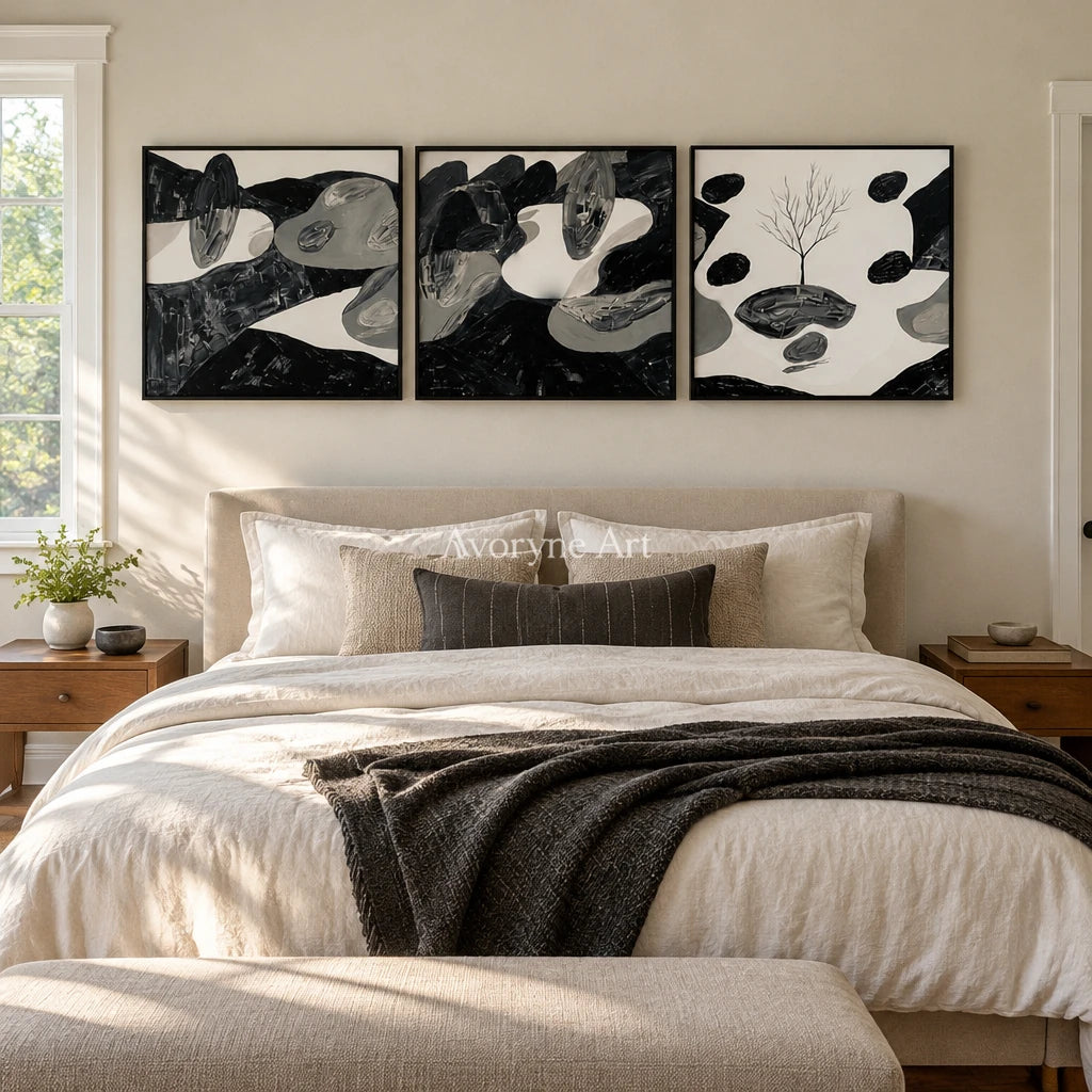 Misted Haven surreal stone landscape triptych with a black frame above a bed in a bedroom