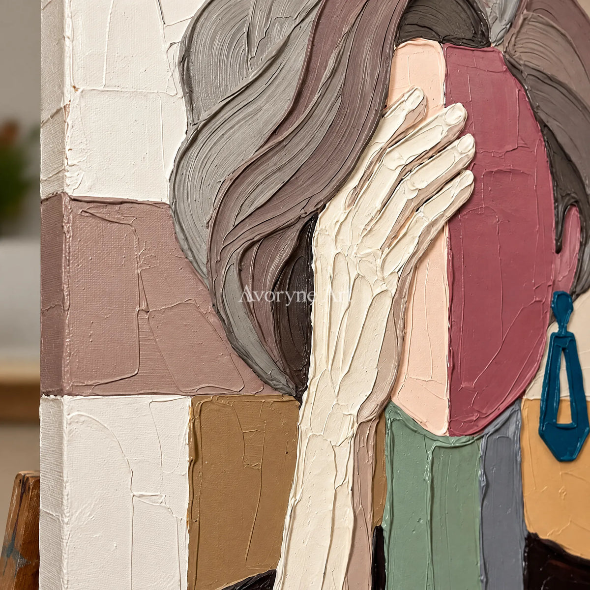 Close-up of the hand-painted texture of Blue Cadence textured portrait wall art on an easel