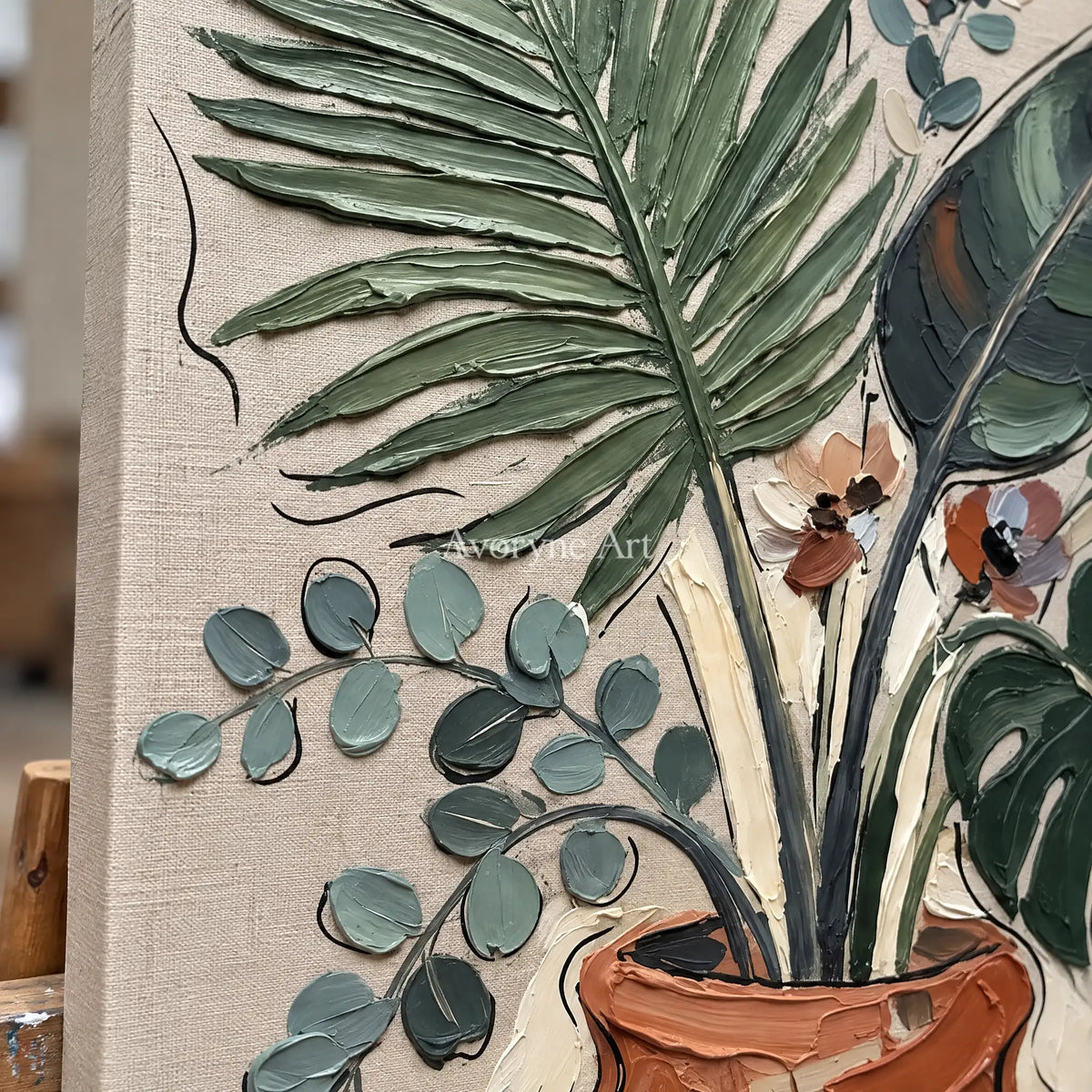 Close-up of the hand-painted texture of Silver Cadence vase and foliage wall art on an easel
