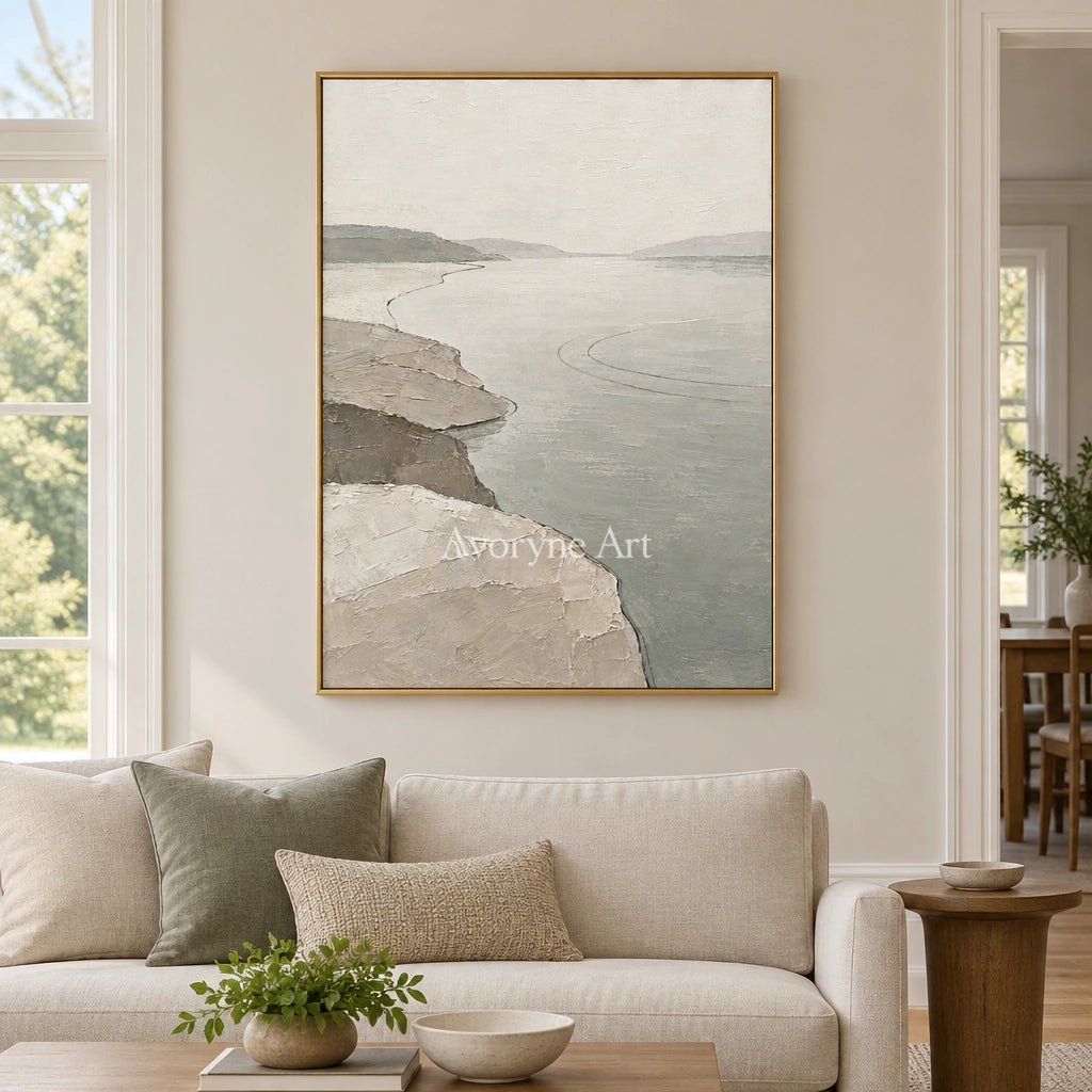 Tender Reverie waterside landscape wall art with a gold frame hanging in a living room