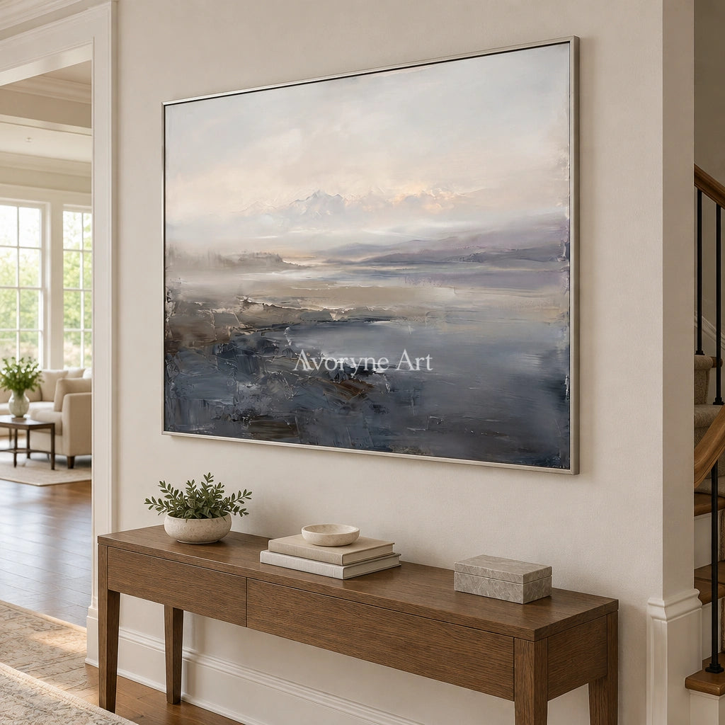 Winding Current waterside landscape wall art with a silver frame in an entryway