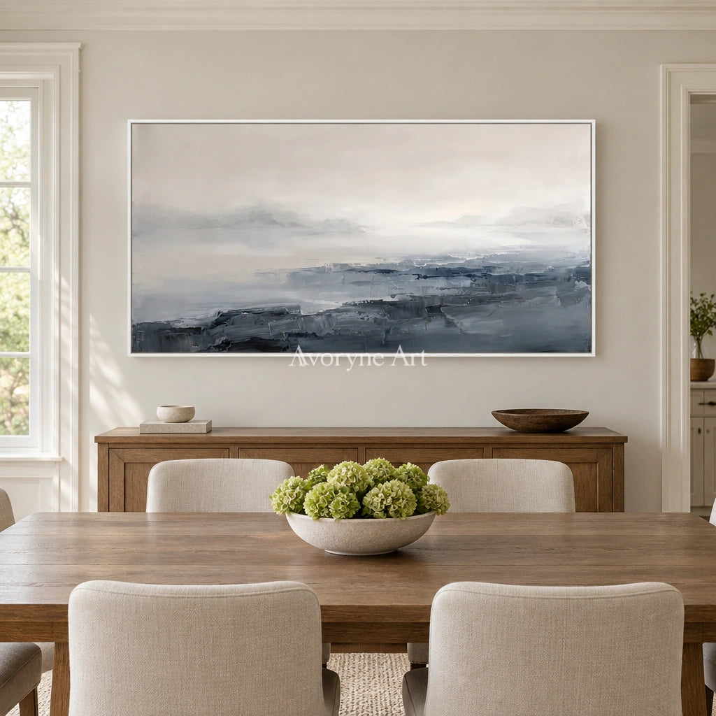 Winding Dialogue waterside landscape wall art with a white frame in a dining room