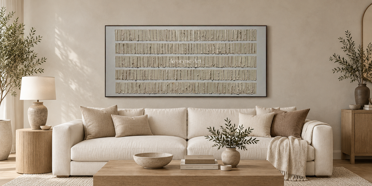 Conceptual living room mockup with a panoramic painting above an ivory sofa.
