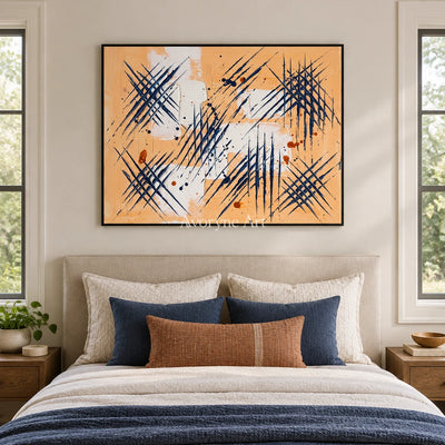 Silver Dialogue abstract brushwork wall art with a black frame above a bed in a bedroom