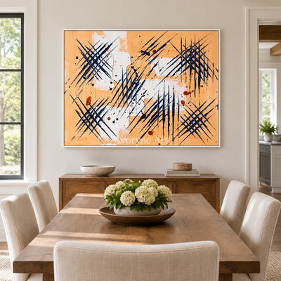 Silver Dialogue abstract brushwork wall art with a white frame in a dining room
