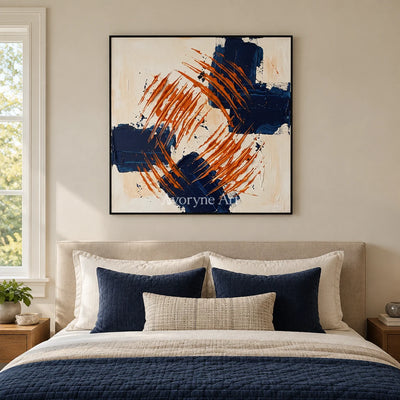 Golden Echo abstract brushwork wall art with a black frame above a bed in a bedroom