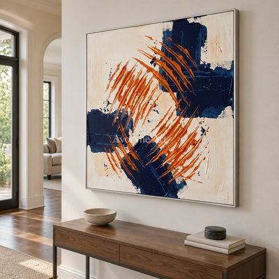 Golden Echo abstract brushwork wall art with a silver frame in an entryway