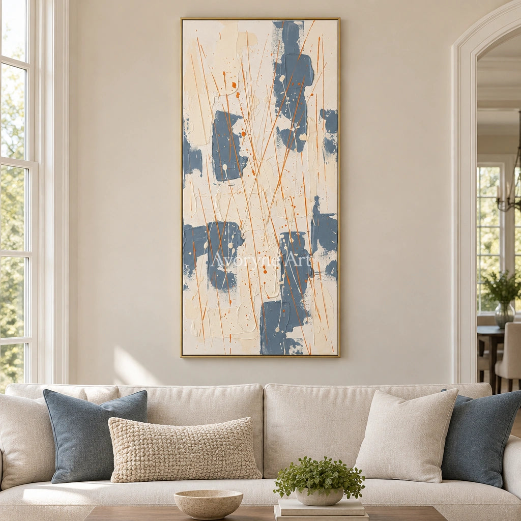 Golden Gesture abstract brushwork wall art with a gold frame hanging in a living room