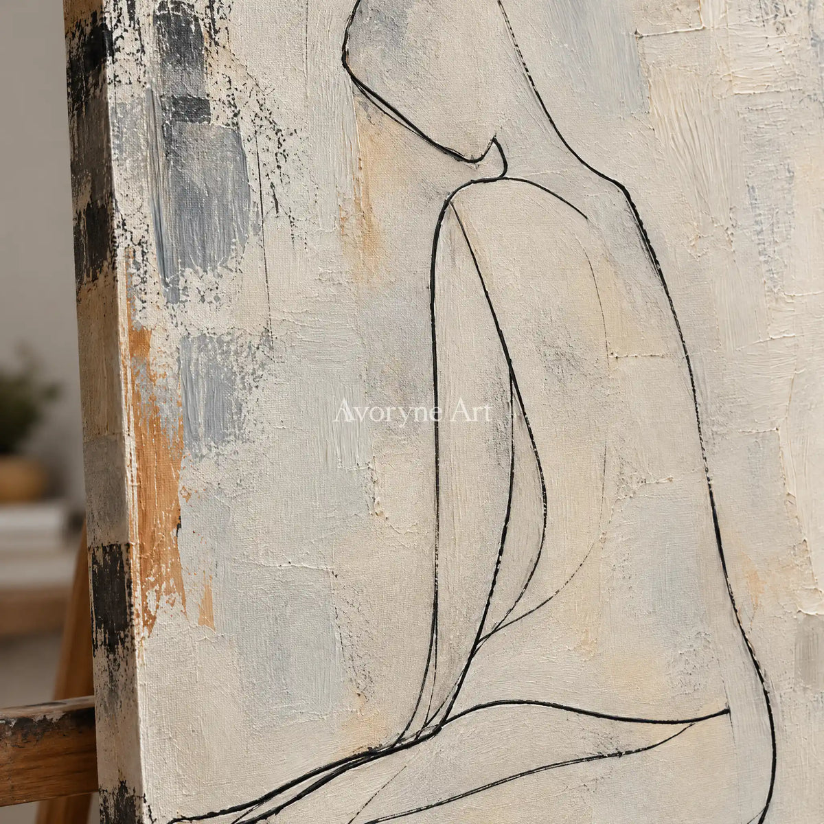 Quiet Outline: Beige Seated Figure Wall Art — detail easel