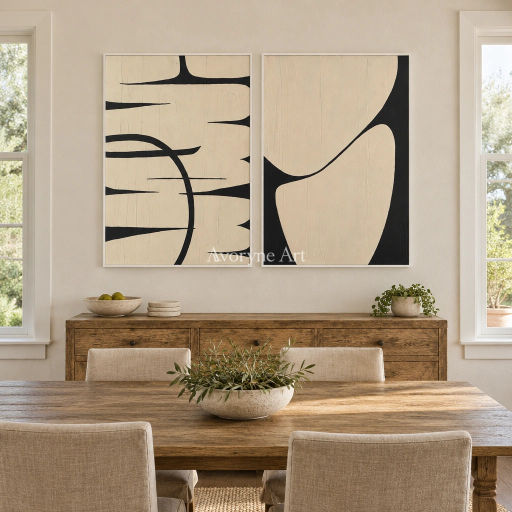 Muted Trace black ivory line art diptych with a white frame in a dining room