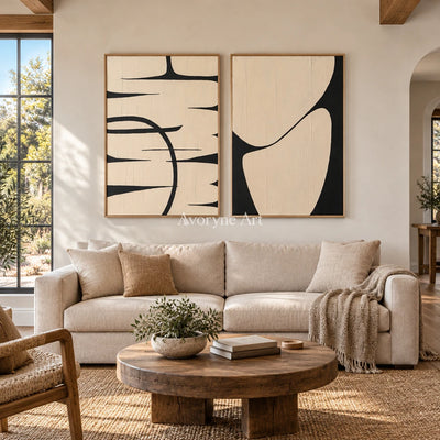 Muted Trace black ivory line art diptych with a wood frame in a villa living space